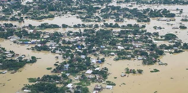 Aerial view of a large Assam settlement submerged by floodwater