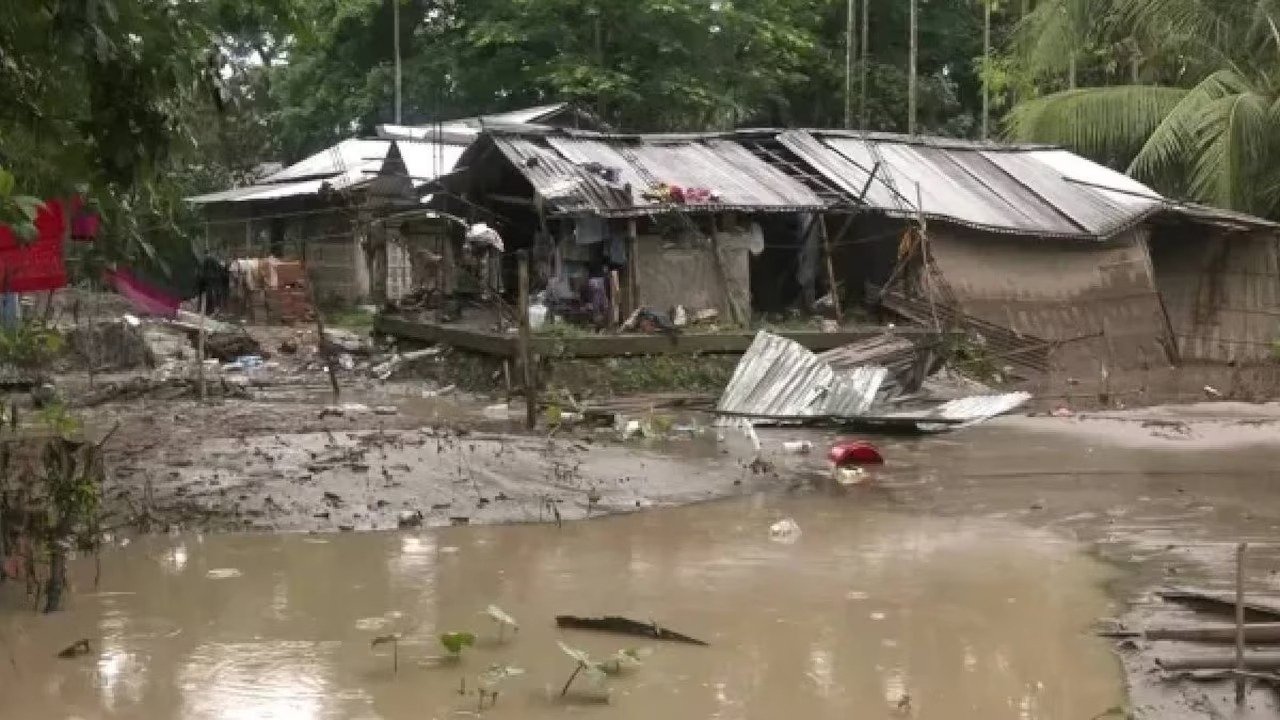 Assam homes left standing in thick mud and debris after floodwater receded